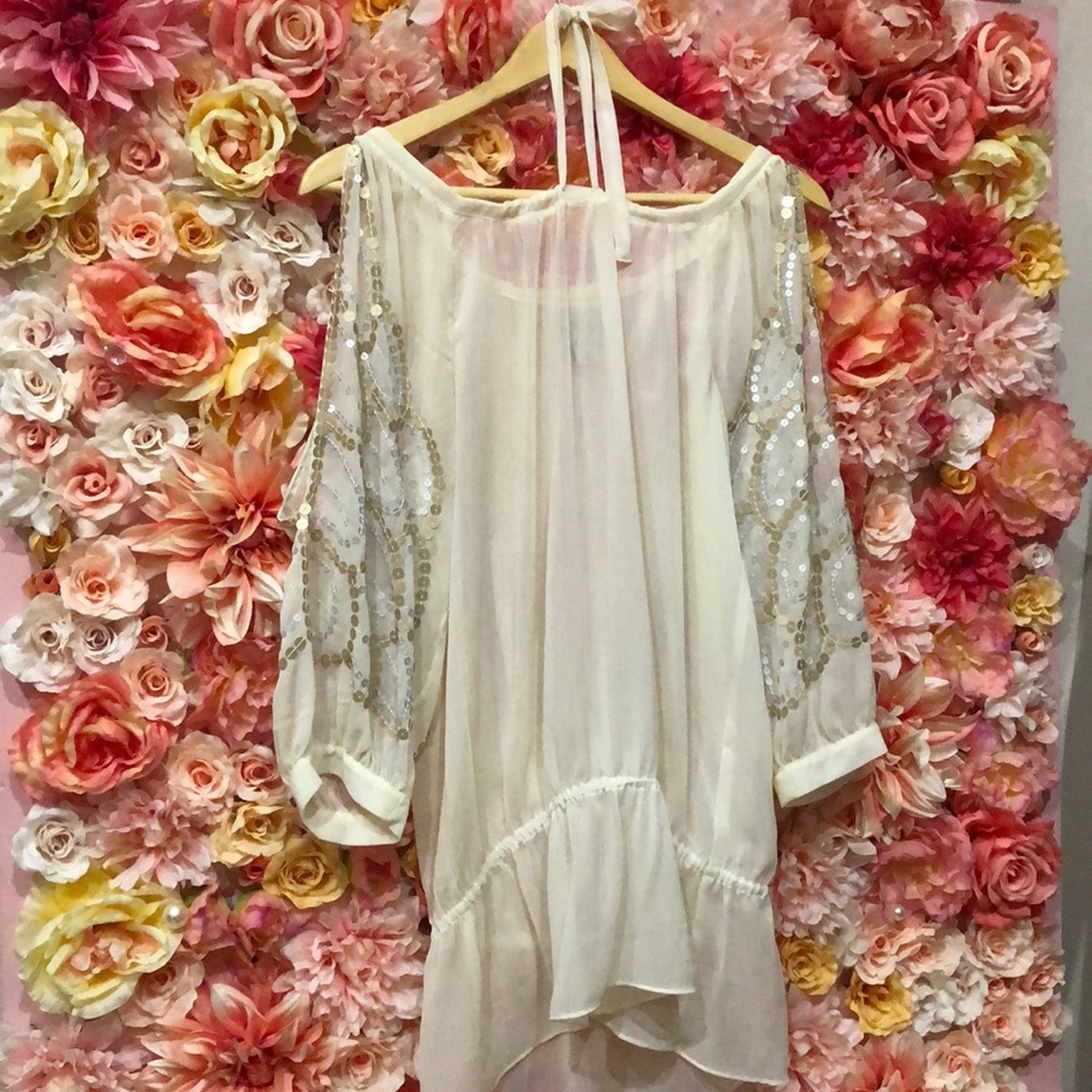 Sheer top with sequin design